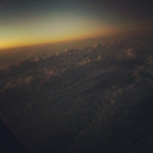 Beginning of  a sunrise I captured from the plane.